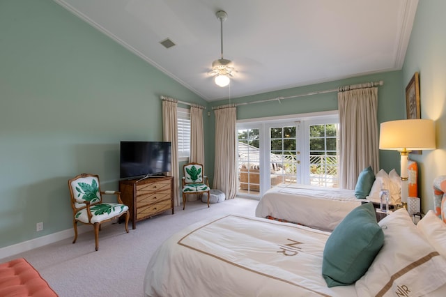 bedroom with ceiling fan, light carpet, vaulted ceiling, crown molding, and french doors