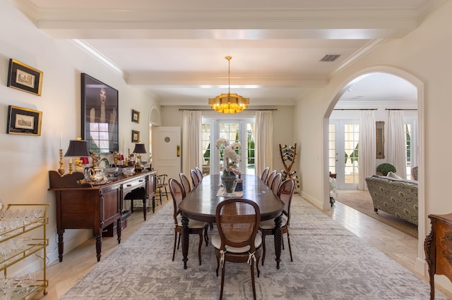 tiled dining space with a notable chandelier, crown molding, french doors, and beamed ceiling