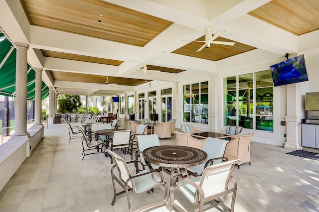 view of patio featuring ceiling fan