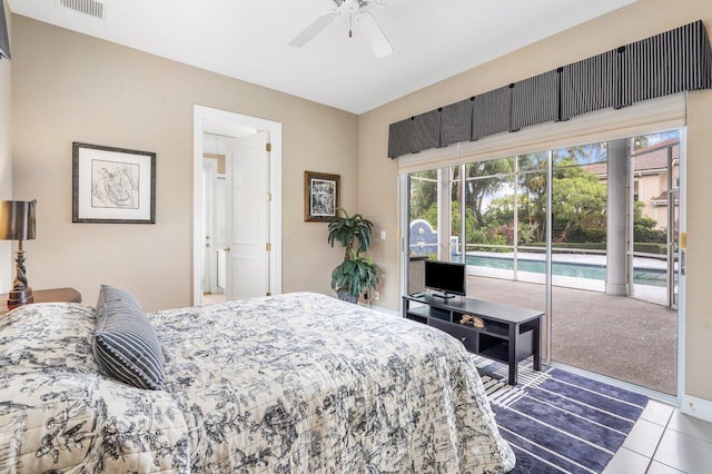 tiled bedroom featuring ceiling fan and access to outside