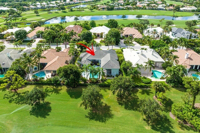 drone / aerial view with a water view