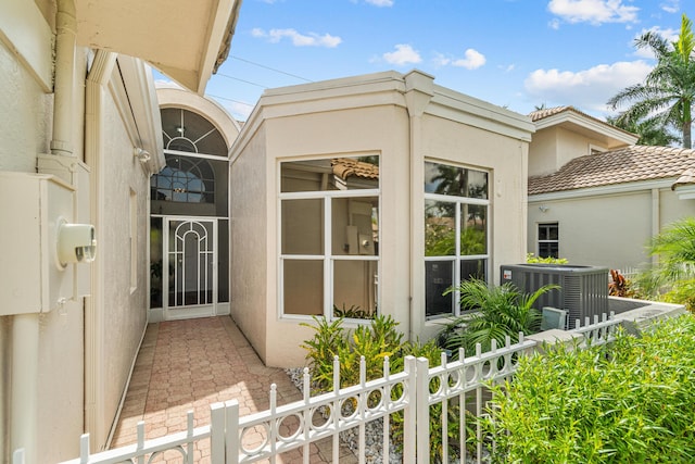 entrance to property with central AC unit