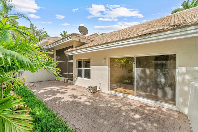 back of property with a patio area