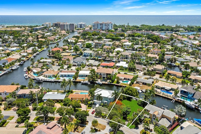 drone / aerial view featuring a water view