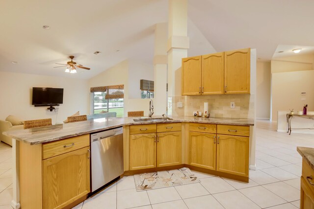 kitchen with stainless steel dishwasher, light tile floors, ceiling fan, tasteful backsplash, and sink