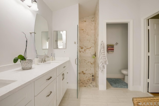 bathroom featuring toilet, double sink vanity, lofted ceiling, tile floors, and an enclosed shower