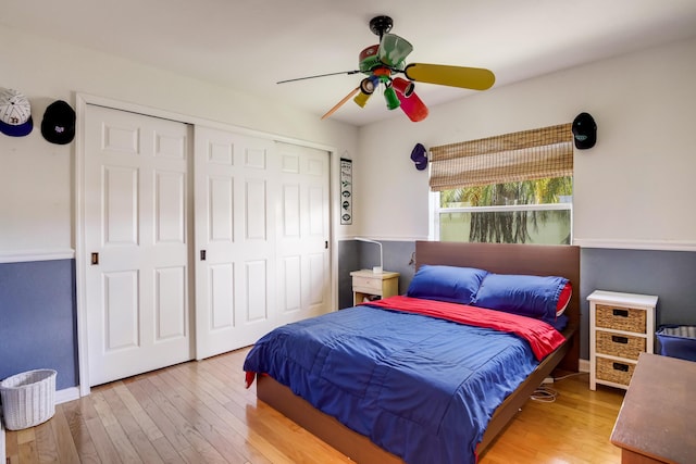 bedroom featuring ceiling fan and light wood-type flooring