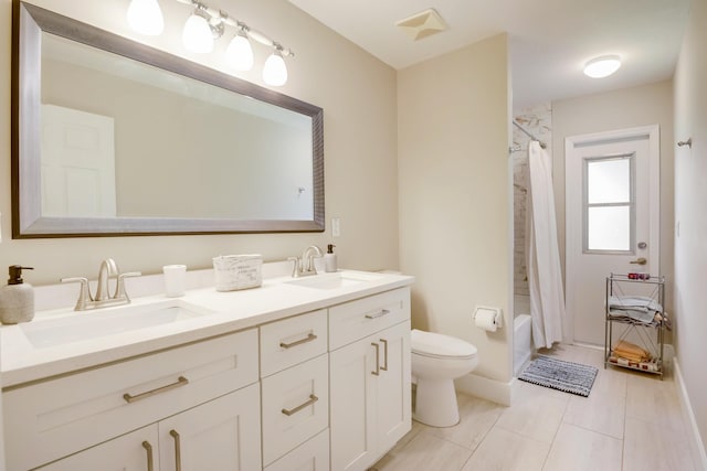 full bathroom featuring toilet, shower / tub combo with curtain, dual sinks, tile flooring, and large vanity