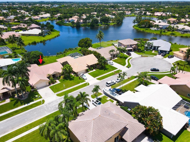 birds eye view of property featuring a water view