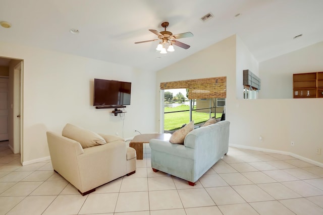 tiled living room featuring ceiling fan and high vaulted ceiling