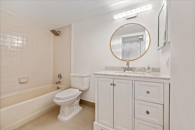 full bathroom featuring toilet, vanity, tiled shower / bath, and tile flooring