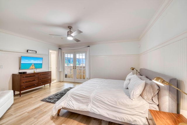 bedroom with access to exterior, ceiling fan, french doors, light hardwood / wood-style flooring, and ornamental molding