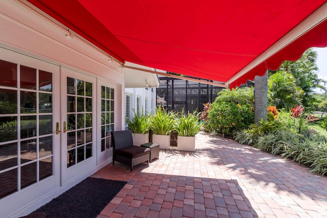 view of patio featuring french doors