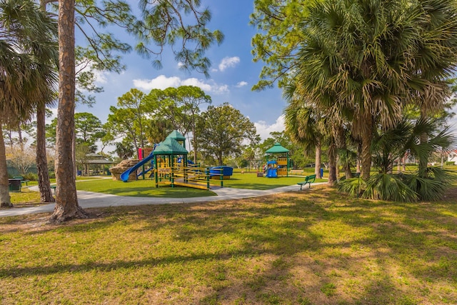 view of playground with a yard