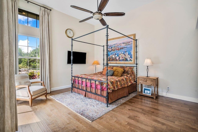 bedroom featuring ceiling fan and wood-type flooring