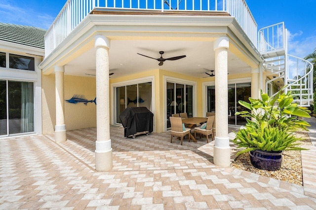 view of patio / terrace featuring ceiling fan and a grill