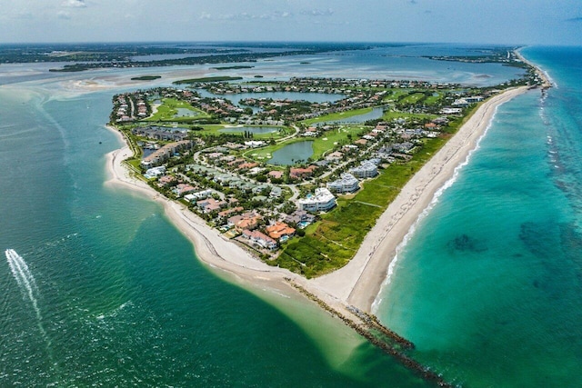 aerial view featuring a water view and a view of the beach