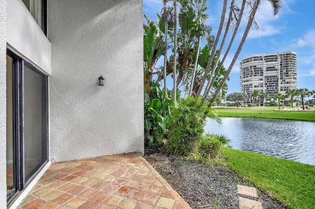 exterior space with a water view