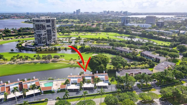 birds eye view of property featuring a water view