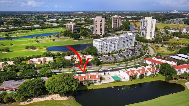 drone / aerial view with a water view