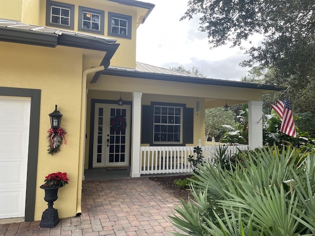 property entrance with a porch