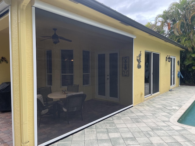 exterior space featuring a patio area and ceiling fan