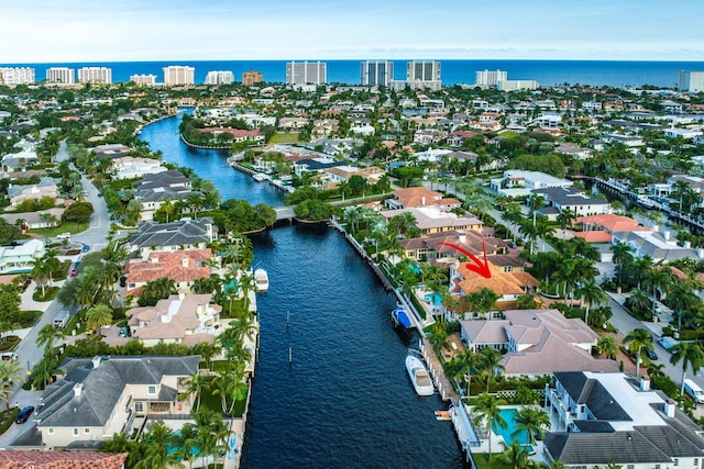 drone / aerial view with a water view