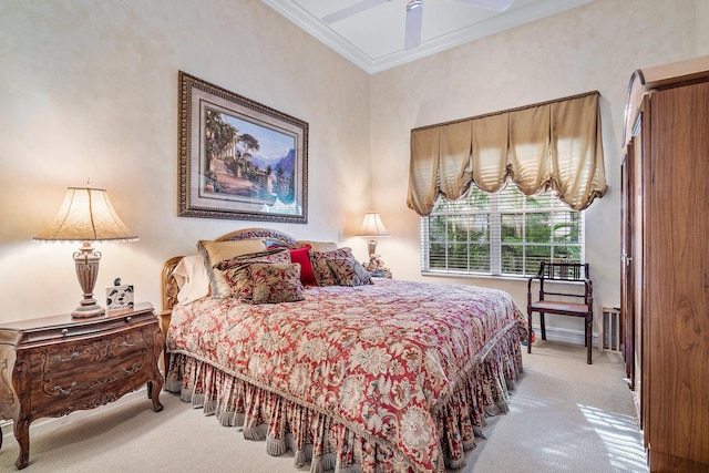 bedroom with light carpet, crown molding, and ceiling fan