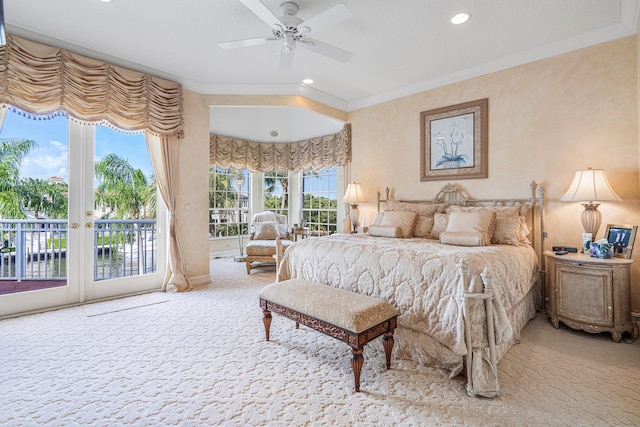 carpeted bedroom featuring ceiling fan, ornamental molding, and access to exterior