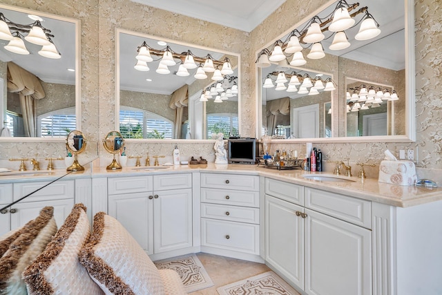 bathroom featuring vanity, tile patterned flooring, and ornamental molding