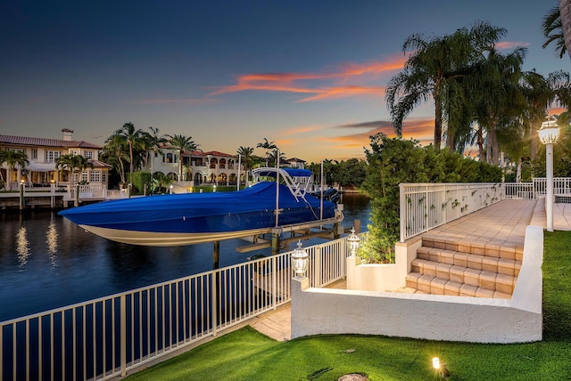 dock area with a water view