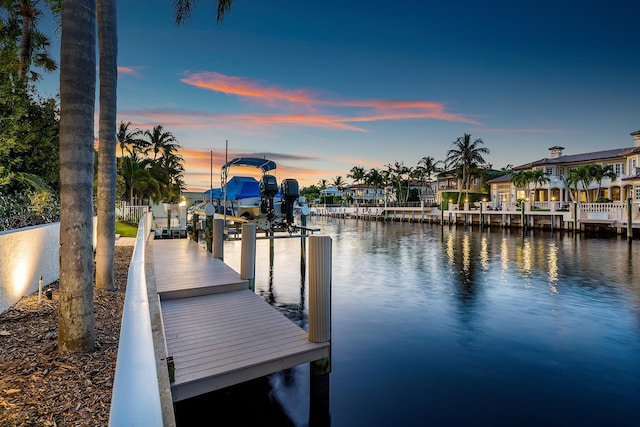 dock area with a water view