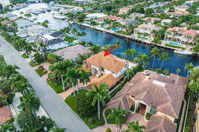 bird's eye view with a water view