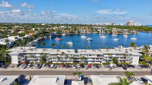 birds eye view of property featuring a water view