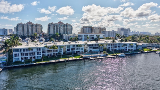 birds eye view of property featuring a water view