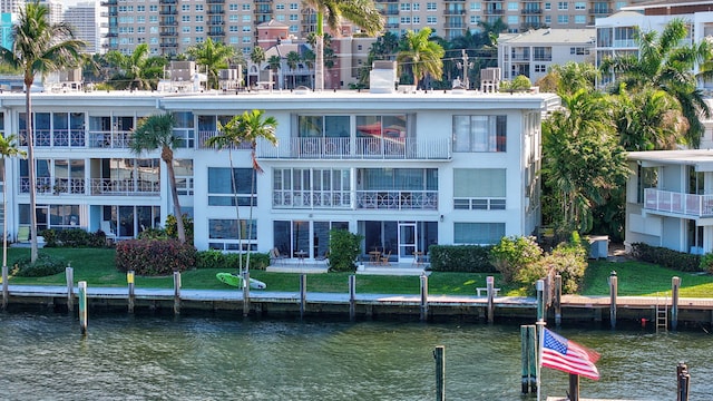 view of building exterior featuring a water view