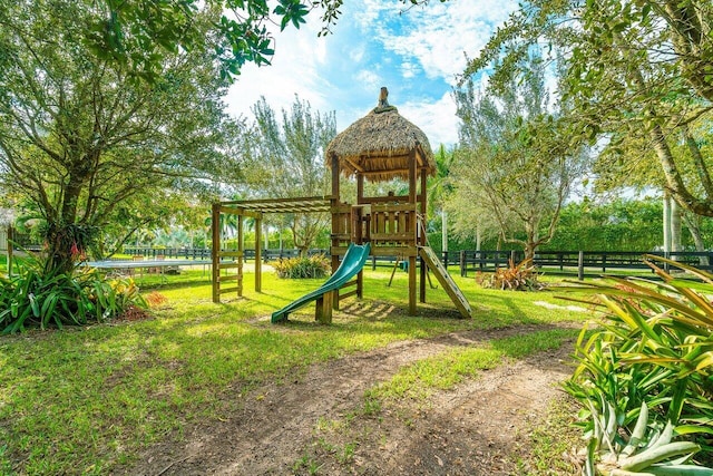 view of play area with a yard