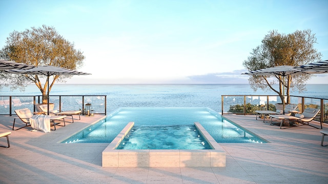 view of swimming pool with an in ground hot tub, a water view, and a patio area