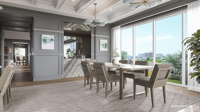 dining space with a notable chandelier, a healthy amount of sunlight, and light hardwood / wood-style flooring