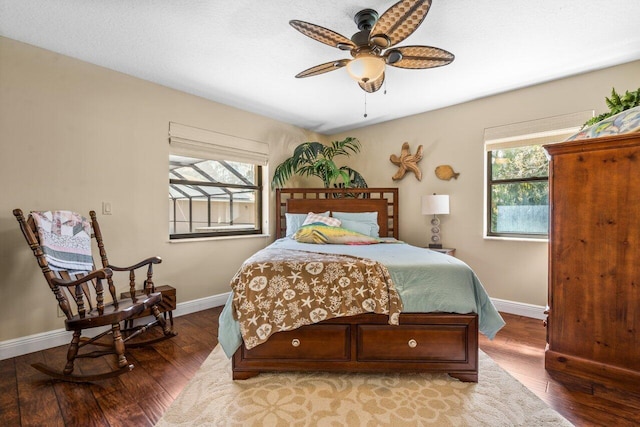 bedroom featuring wood-type flooring and ceiling fan