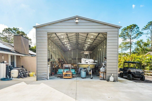 garage featuring a carport