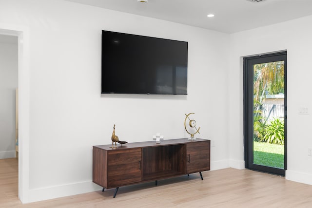 interior space with hardwood / wood-style floors