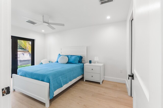 bedroom featuring ceiling fan and light hardwood / wood-style flooring