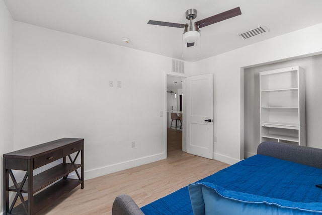 bedroom featuring ceiling fan and light hardwood / wood-style floors