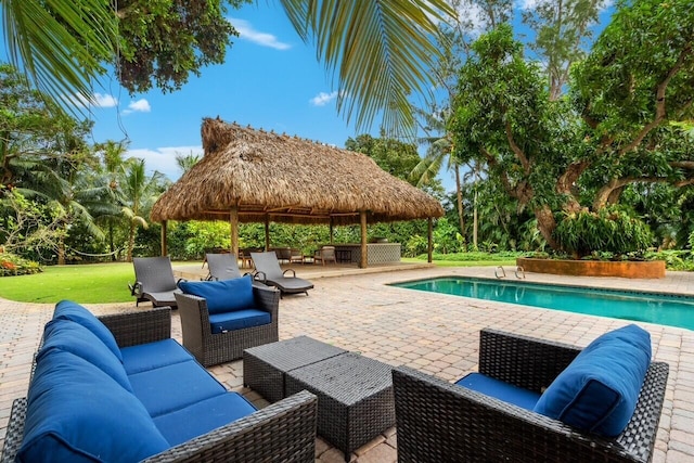 view of swimming pool with a gazebo, a patio area, and outdoor lounge area