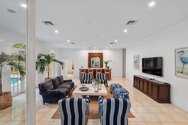 living room with light tile patterned flooring