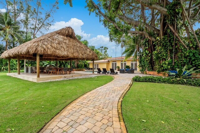 view of swimming pool with french doors, an outdoor living space, and a patio