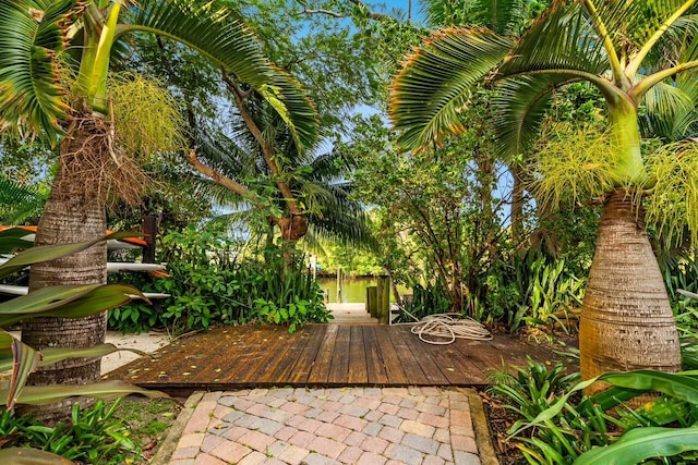 view of patio featuring a boat dock