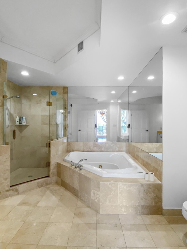 full bathroom with visible vents, a stall shower, a bath, and recessed lighting