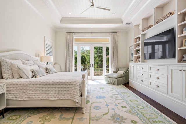 bedroom with dark wood-type flooring, crown molding, wood ceiling, a tray ceiling, and access to exterior